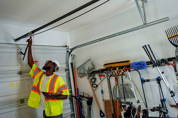 Professional Garage Door Roller Replacement technician working in Rome City, IN